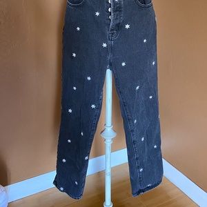 black jeans with flower embroidery